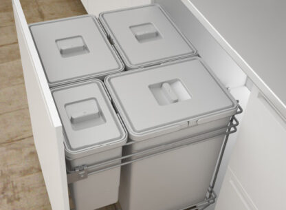 cajón abierto con cubos de basuras de doble instalación